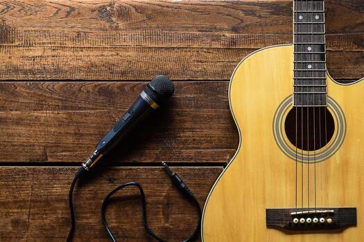 Acoustic guitar and microphone ready for a live performance