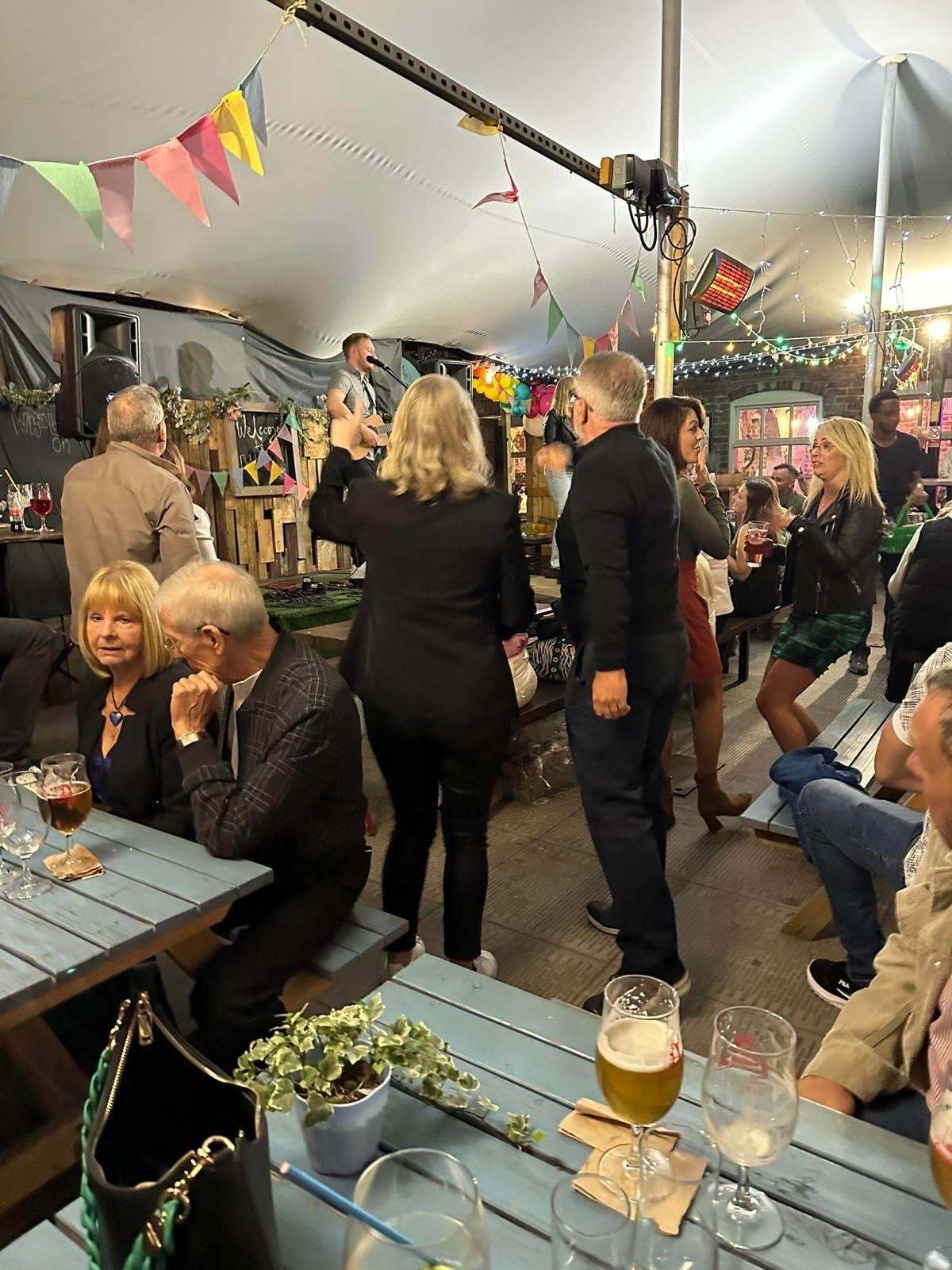 Guests enjoying Ben's live music